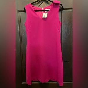 New Eliza J
Pink never worn with tags woman’s dress. size 6